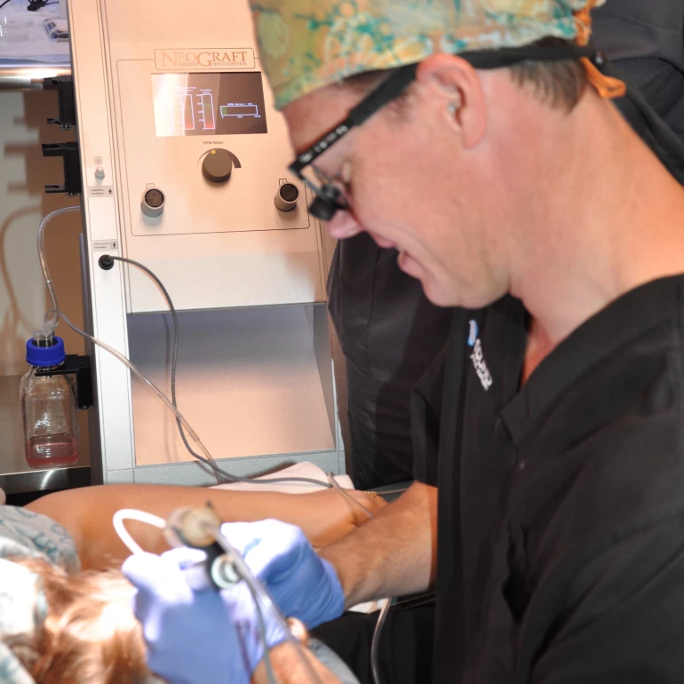 scott-with-neograft-machine